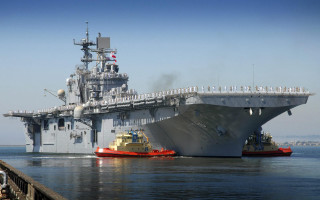 Large ship docked tug boat - nearby free wallpaper