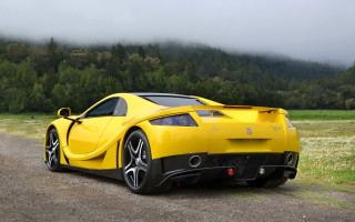 Yellow sports car forest hills - a foggy sky free wallpaper for desktop