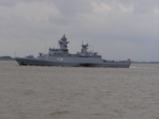 Battleship shoreline boat cloudy sky - 100mm free wallpaper