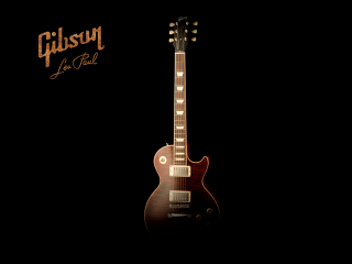Guitar black background gibson logo - against a black background free wallpaper