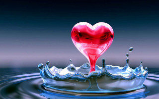 Heart shaped object floating water 4 - a splash of water free wallpaper