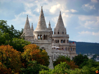 Castle spires trees cloudy sky - medieval free wallpaper
