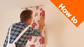 Man painting wall flowered wallpaper 3 - detail free wallpaper