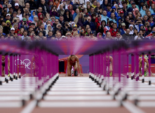 Group people pink chairs stadium - dynamic camera angle free wallpaper