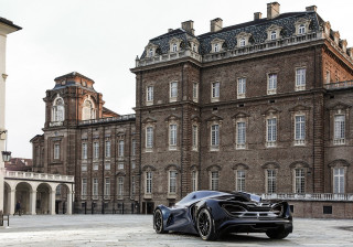 Black sports car cityscape clock - future free wallpaper for desktop