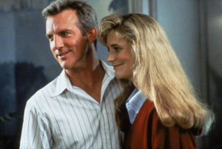 Man woman standing room window 3 - a window behind them free wallpaper