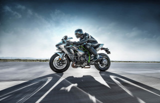 Man motorcycle road cloudy sky - a road under a cloudy sky free wallpaper