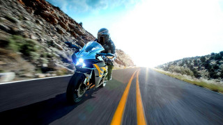 Motorcycle ride mountain road sky - a yellow line free wallpaper