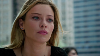 Woman blue eyes city skyscrapers - a city in the background free wallpaper