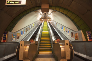 Subway station yellow staircase sign - claire dalby free wallpaper