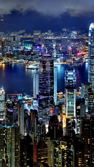 City skyline night lights water - free city wallpaper for mobile