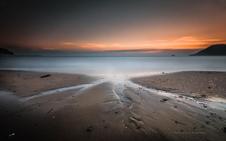 Pastel beach sunset boat clouds - the middle of it free wallpaper