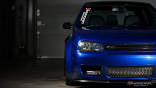 Blue car parked garage license - a license plate free wallpaper