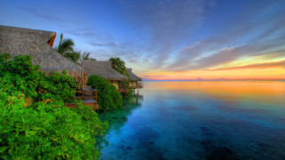 Tropical resort sunset ocean dock - roof free wallpaper