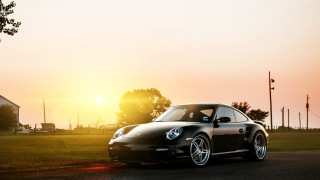 Black porsche parked road sunset - a black porsche free wallpaper