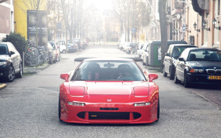 Red sports car street tilt - clean line free wallpaper