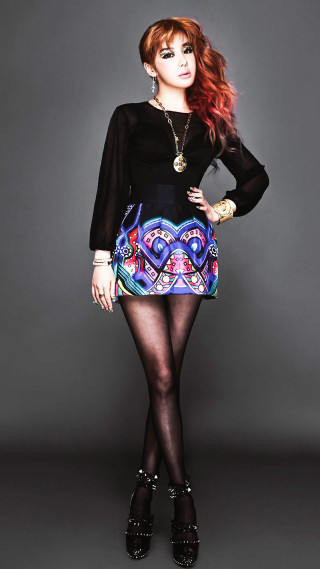 Woman black top colorful skirt 2 - contemporary free wallpaper for mobile