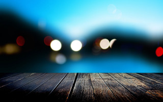Wooden table blurry lights lake 2 - blurry free wallpaper for desktop