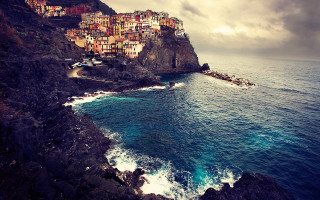 Village cliff ocean waves crashing - a small village free wallpaper