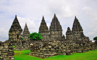 Stone structures field trees cloudy - a cloudy sky above them free wallpaper