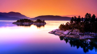 Sunset lake island mountains beautiful - a beautiful sunset over a lake free wallpaper