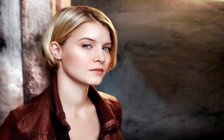 Woman brown jacket studio setting - a picture in a studio setting free wallpaper