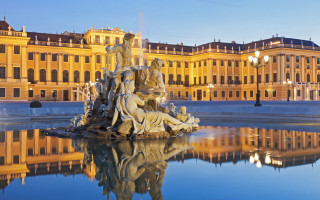 Fountain statues clocktower building foreground - a fountain free wallpaper