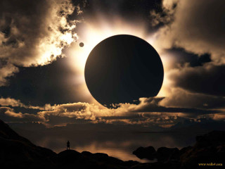 Solar eclipse water rock person - a solar eclipse free wallpaper