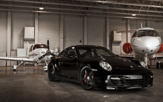 Black sports car garage small - the ground in front free wallpaper for desktop