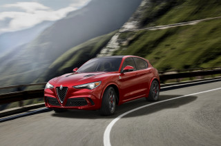 Red alfa car driving mountain - path free wallpaper