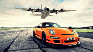 Airplane flying over car runway 2 - a large airplane free wallpaper