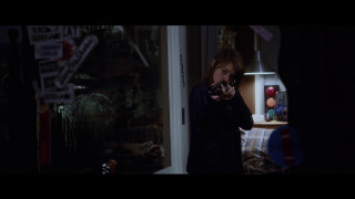 Woman holding camera dark room - a window open free wallpaper