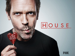 Man holding heart shaped lollipop - it in front free wallpaper