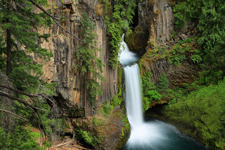 Waterfall deepblue river woods fallen - tree in the foreground free wallpaper