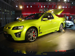 Yellow car showroom display people - other car free wallpaper