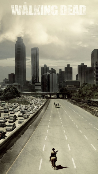Skateboarder cityscape apocalyptic cloudy sky - free sci-fi wallpaper