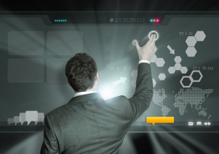 Man suit touching screen light - technology free wallpaper