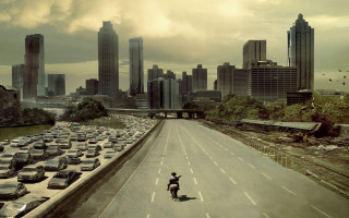 Skateboarder riding street parking lot - epic scene free wallpaper