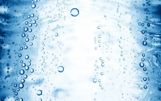 Water bottle bubbles blue background - a white spot free wallpaper