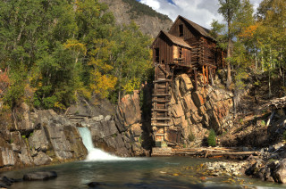 Wooden cabin cliff waterfall foreground - the cliff free wallpaper