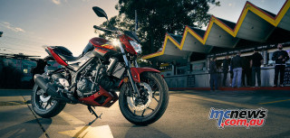 Red motorcycle night promotional vehicle - a red motorcycle free wallpaper