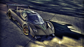 Black race car parked street - realistic free wallpaper