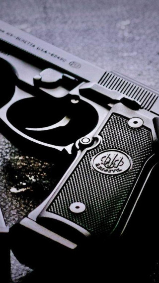 Gun closeup table black white - christian hilfgott brand free wallpaper for mobile
