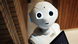 Robot smiling ai mitsu cybernetics - a robot holding free wallpaper