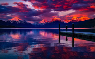 Sunset lake mountains dock mystical - a dock in the foreground free wallpaper