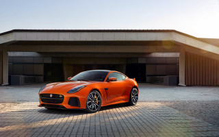 Orange sports car garage door - a building free wallpaper