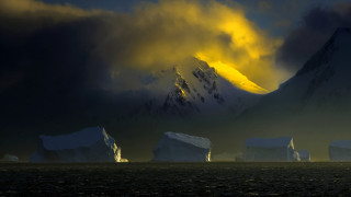 Mountain icebergs cloudy sky ecological - dramatic light free wallpaper