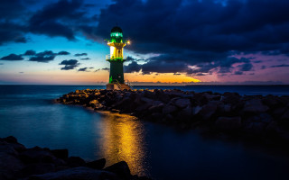 Lighthouse rocky shore night mystical - a lighthouse free wallpaper