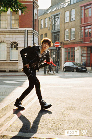 Man black jacket skateboarding city - a black jacket free wallpaper for mobile