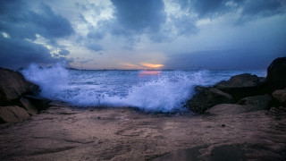 Wave rocky beach sunset lighthouse - a rocky beach free wallpaper